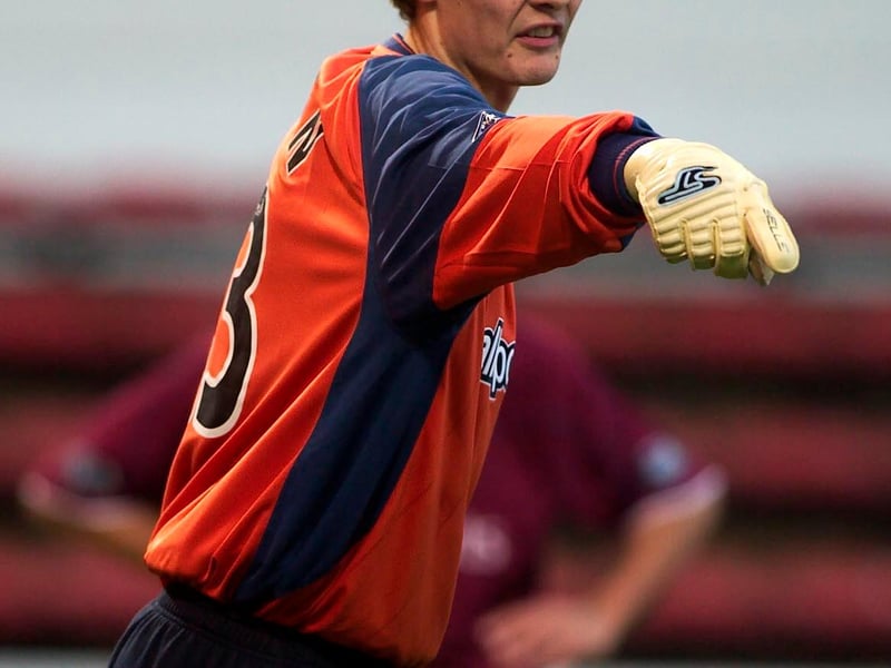 Helped Hearts to the best defensive record outwith the Old Firm in a third-place finish in season 2003-04 to earn his first senior Scotland cap at the age of 21.
