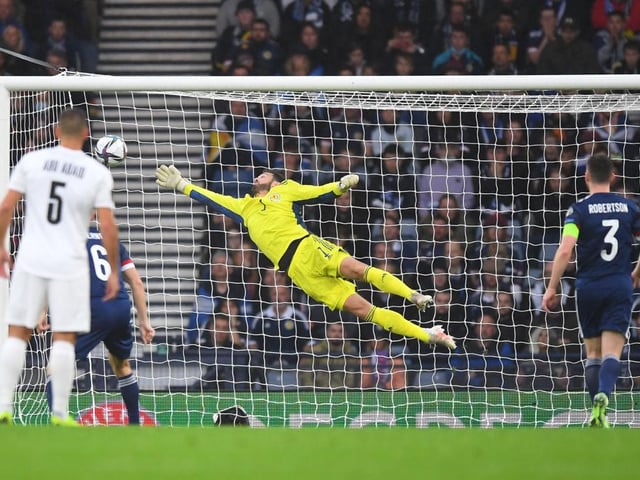 Let down by his wall at free-kick opener (pictured), vital stop to deny Zahavi in second half.
