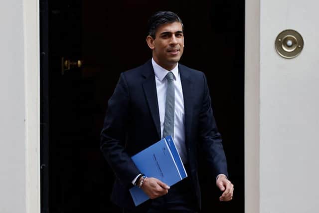 Chancellor of the Exchequer Rishi Sunak leaves 11 Downing Street for parliament to make his spring statement