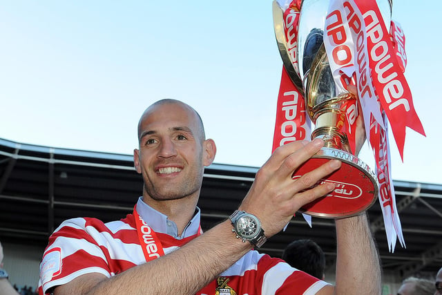 Captain Rob Jones with the League One trophy
