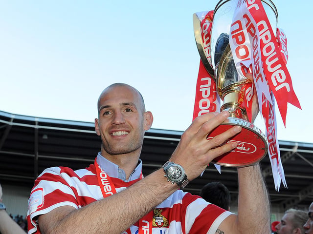 Captain Rob Jones with the League One trophy