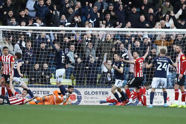Jake Cooper of Millwall scores to make it 1-0 during the Sky Bet Championship match against Sheffield United at the Den last season: Paul Terry / Sportimage