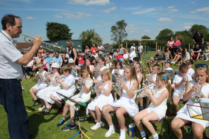 The Brass Band at Wadworth School playing their instruments on May Day.