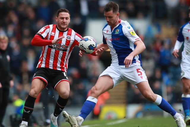 Substitute Billy Sharp of Sheffield United tussles with Dominic Hyam of Blackburn Rovers  during the Sky Bet Championship match at Ewood Park: Simon Bellis / Sportimage