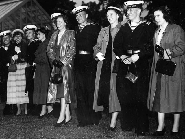 Sverdlov sailors visit Portsmouth. In June 1953 Russian sailors from the cruiser Sverdlov visited the city.
A happy group of Russian sailors from the Soviet cruiser 'Sverdlov' enjoying themselves in the company of some Portsmouth girls during a garden party in Portsmouth, England, 12th June 1953.  The crews of the ships assembled at Spithead in readiness for the Coronation Naval Review, were given a civic welcome in the form of a garden party at Portsmouth, and the Russian sailors were invited to join the fun.  (Photo by Fox Photos/Hulton Archive/Getty Images)