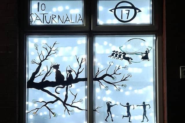 A stunning Advent display on 26 Passhouses Road, Pitsmoor. This display states 'Lo Saturnalia' an ancient roman phrase.