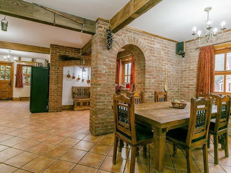 A cute breakfast/dining area, just off the kitchen. Nearby is a utility or laundry room too, plus a downstairs WC with cloakroom.