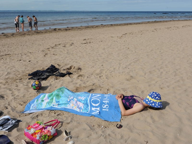 An excellent spot for sunbathing and paddling.