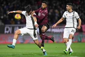 Dimitrios Nikolaou of Spezia Calcio vies with Lys Mousset of US Salernitana on loan from Sheffield United during the Serie A match between US Salernitana and Spezia Calcio at Stadio Arechi on February 07, 2022 in Salerno, Italy. (Photo by Francesco Pecoraro/Getty Images)