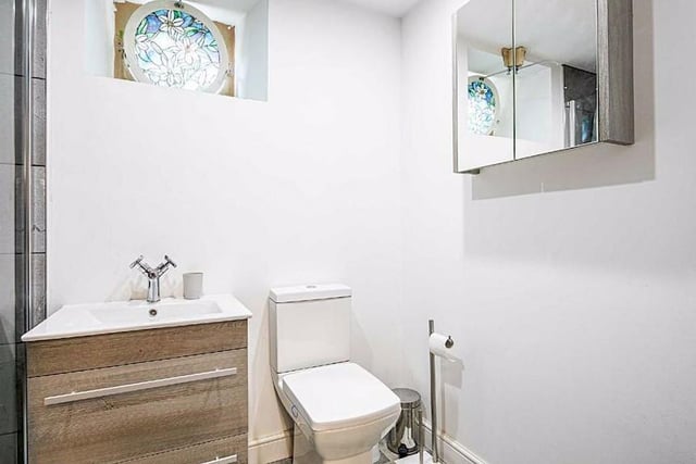 The bathrooms have been renovated with modern units and tasteful tiles.