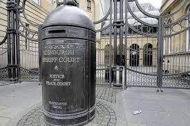 A former antiques dealer from East Lothian who was extradited from Thailand to face charges of historic child sexual abuse was jailed in November.
John Martin, who used to live in Haddington, was brought back to Scotland by National Crime Agency (NCA) officers in December 2023 after moving to Bangkok several years earlier. The 74-year-old, who formerly worked in an antiques store in Edinburgh’s Grassmarket, stood trial at Edinburgh Sheriff Court where he was found guilty of three charges on October 25. He subjected two young girls to a campaign of sexual abuse lasting almost a decade between the mid-1980s and 1990s. His offending took place at various locations in Perth & Kinross, Fife and East Lothian.
On November 8, at the same court, Martin was sentenced to three years and three months imprisonment. His name has been added to the sex offenders register indefinitely. Non-harassment orders, banning Martin from contacting or attempting to contact the victims, were granted for a period of 20 years.