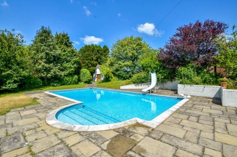 The house comes with a heated outdoor swimming pool.
