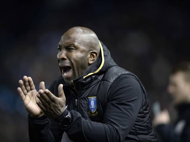 Darren Moore has the backing of Sheffield Wednesday's Dejphon Chansiri.
