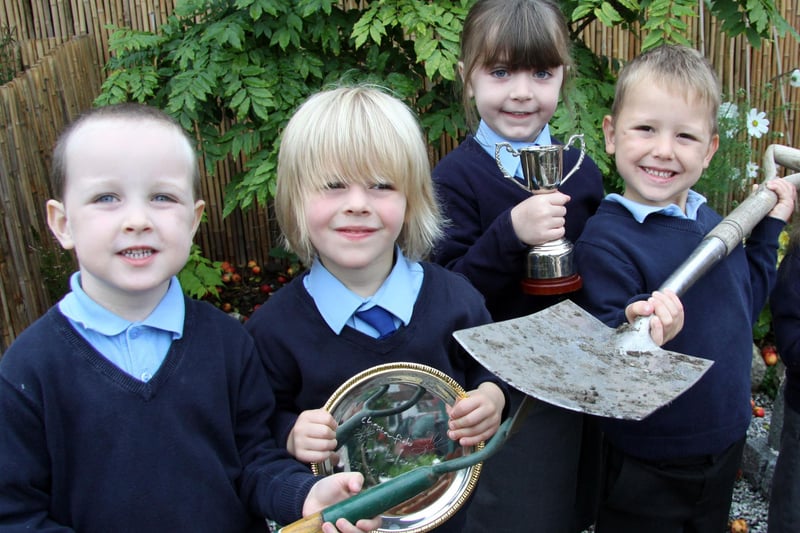 Connor Farrow, Joseph Sadler, Lucy Donnelly, Ethan Chandler, left to right, from St Mary's Primary School, winner of an award at Chesterfield in Bloom in 2010.
