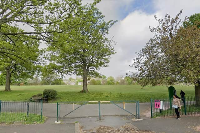 A man is wanted after a woman was thrown to the ground in an attack in Firth Park on Saturday.