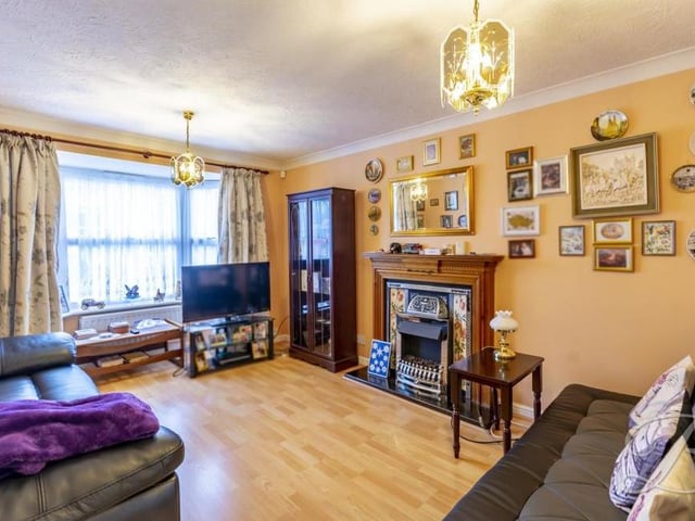 The homely living room provides a fantastic focal point for the house, with its feature fireplace and beautiful bay window, offering lots of natural light. From the living room, you can walk into the dining room.