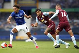 Dominic Calvert-Lewin of Everton takes on Conor Hourihane of Aston Villa during the Premier League match between Everton FC and Aston Villa at Goodison Park on July 16, 2020 in Liverpool, England: Clive Brunskill/Getty Images