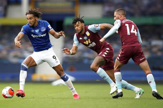 Dominic Calvert-Lewin of Everton takes on Conor Hourihane of Aston Villa during the Premier League match between Everton FC and Aston Villa at Goodison Park on July 16, 2020 in Liverpool, England: Clive Brunskill/Getty Images