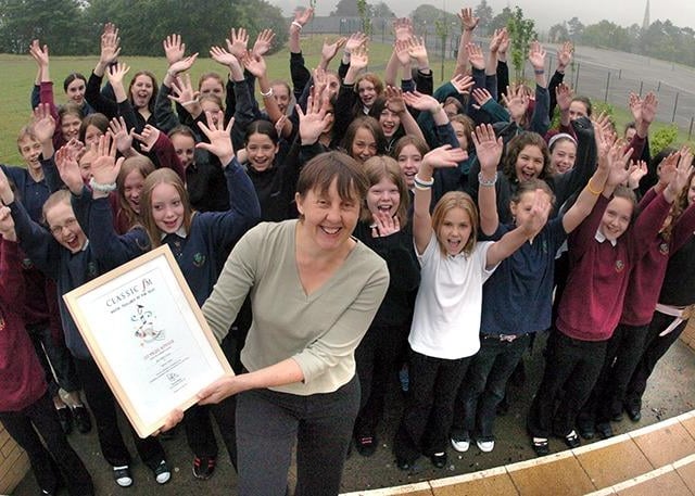 Music teacher of the year Helen Cowen pictured with her lower school choir at Tapton School, Sheffield, June 29, 2005