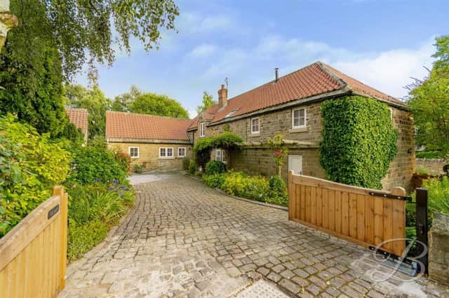 This stunning barn conversion at Heath is on the market with its sellers welcoming offers of around £635,000.
