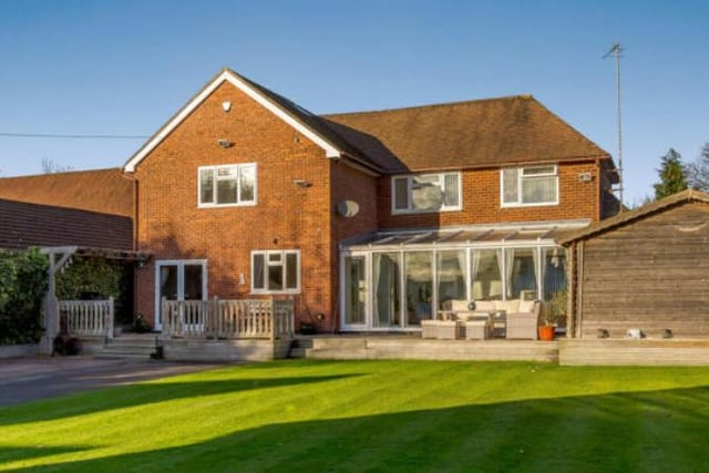 Complete with a conservatory and four "spacious" bedrooms, this property was sold for a price of £585,000.