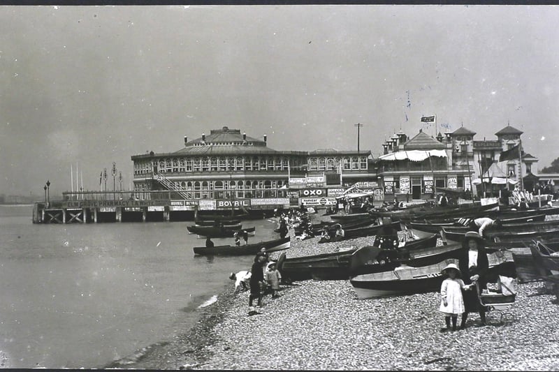 Boats on the beach at Southsea, England, with advertisements for Bovril and Oxo on a building behind, 1896. Photo by Hulton Archive/Getty Images