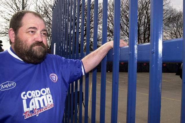 Spireites fan Alan Wilkinson stands outside the gates of Hillsborough awaiting the verdict of the FA Panel on the fate of the club.