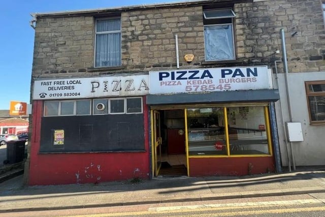 This lot included both the pizza units in the photo and the accommodation above. It was withdrawn before the auction began.
