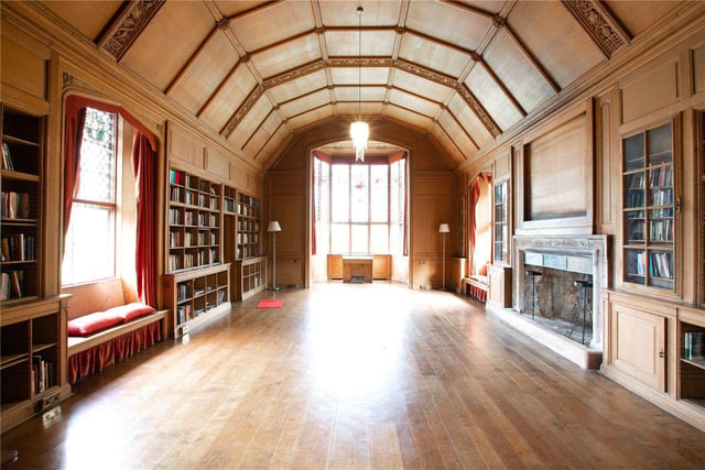 The Lorimer library is complete with woodwork and panelling believed to be by Clow Bros and Louis Davis stained glass windows.