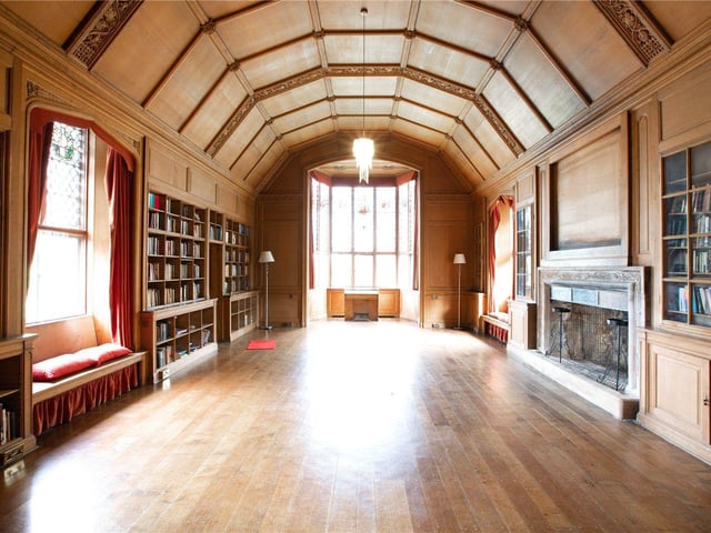 The Lorimer library is complete with woodwork and panelling believed to be by Clow Bros and Louis Davis stained glass windows.