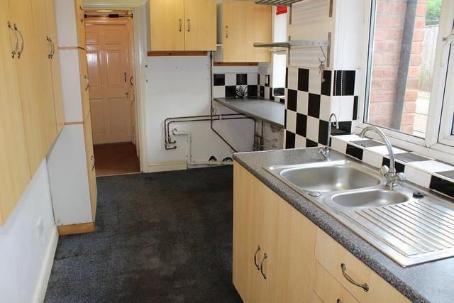 The fitted kitchen is one of the assets of the property. There are wall and base units, work surfaces, stainless-steel sink-unit, breakfast bar, double-glazed door, two double-glazed windows and plumbing for an automatic washing-machine.