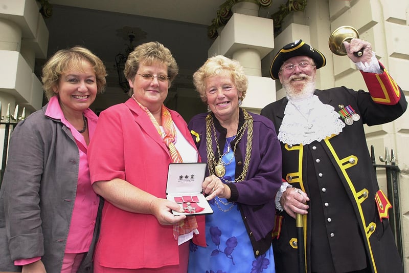 Jo Durdy, who worked at the Acacia Road Care Home in 2001, was pictured with her MBE, the Mayor of Doncaster, Councillor Beryl Roberts, Doncaster Central MP Rosie Winteron and Doncaster's Town Crier Ted Corney, on the steps of the Mansion House.