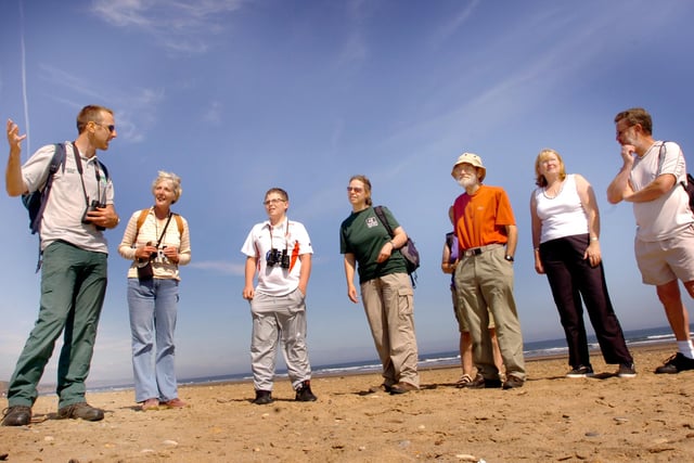 A walk along the beach can be great fun as these ramblers found out in 2007.