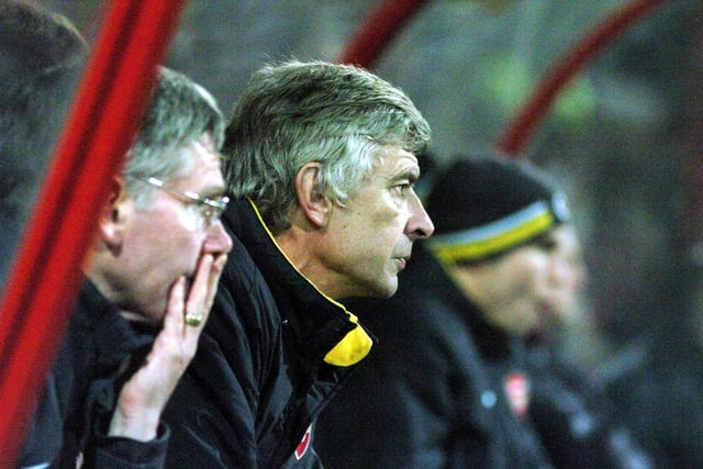 Arsenal boss Arsene Wenger looks unimpressed in the dugout.