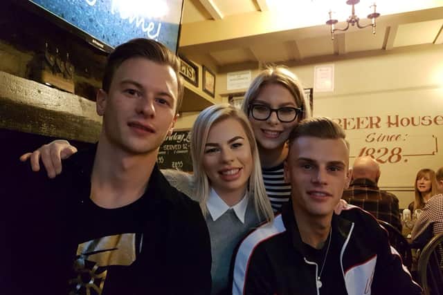 Ellie (second from right) with her sister Faye and brother's Daniel and Jason.
