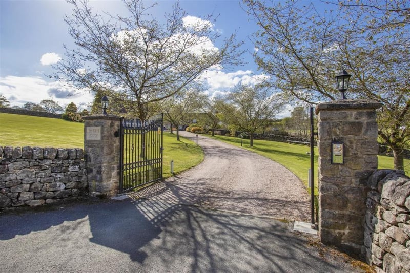 The home enjoys a stunning setting approached via wrought iron electrically operated twin gates,