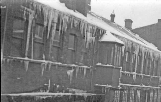 Icicles and snow on the roof at the William Tyzack, Sons and Turner Ltd building, looking towards the General Office, in Nether Edge, Sheffield, in 1947