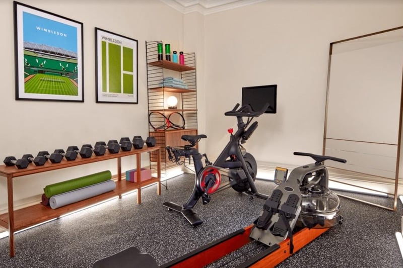 The house gym comes complete with top of the range exercise equiment - inluding a rowing machine, weights and exercise bike.