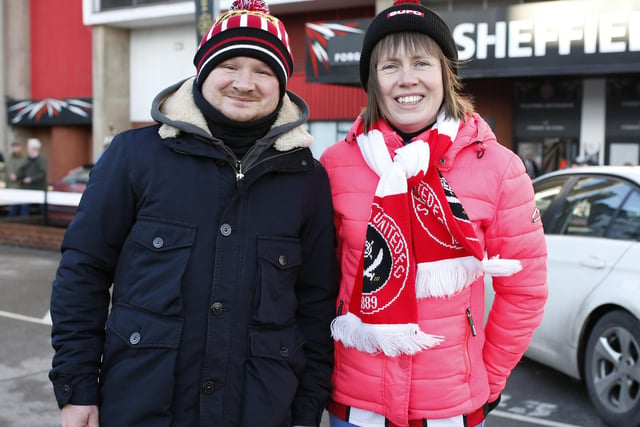 United fans arrive for the Boxing Day clash with Sunderland at Bramall Lane.