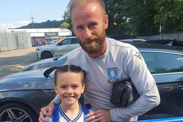 Sapphire Woodliff with her favourite Sheffield Wednesday player, Barry Bannan.