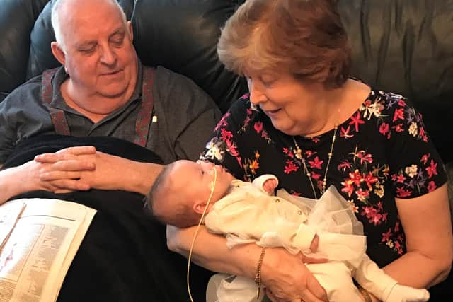 Terry with wife Veronica and Esmae.