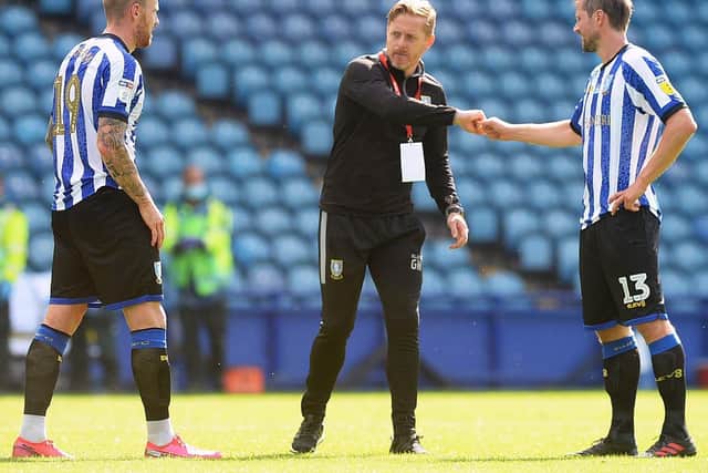 Sheffield Wednesday manager Garry Monk with Connor Wickham and Julian Borner. Pic Steve Ellis