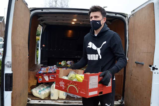Footballer Harry Maguire hands out food parcels in Mosborough.