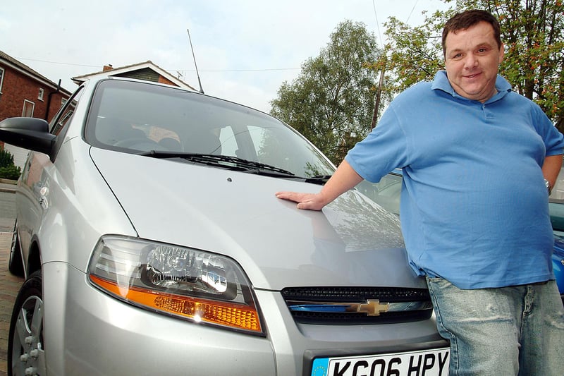 Phil Brearley of Windsor Road, Carlton in Lindrick, pictured with his new Cheverolet car won via the internet 14 years ago