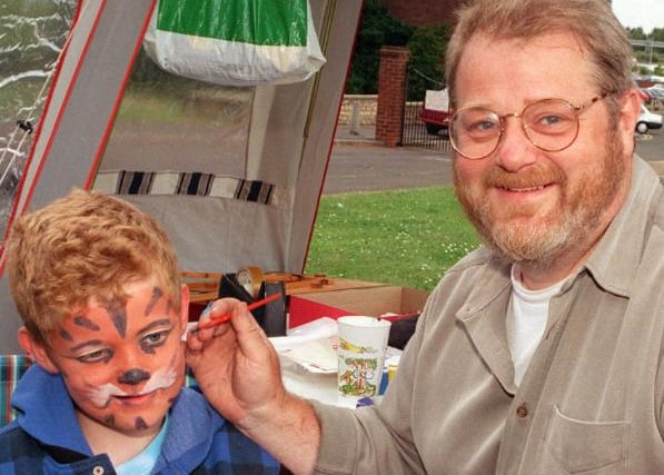 Joseph Baxendale aged seven getting his face painted by his father Neil in 1998.