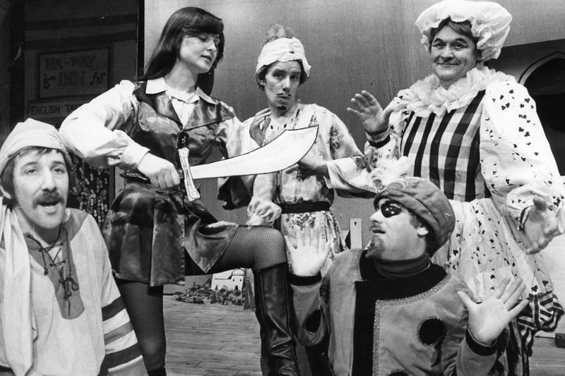 Jarrow Amateur Operatic Society's production of Ali Baba and the Forty Thieves.  Alex Lumley as Ali Baba, with left to right: Ossie Naylor as Hassarac; Helen Lowther as Hamid; Ken Bartley as Abdulla and Alan Grieves as the Dame.