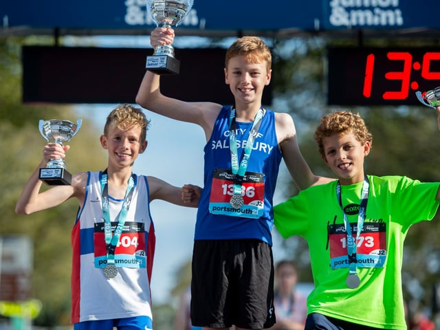 A trio of junior boys celebrate winning in their respective category. Photo: Peter Langdown