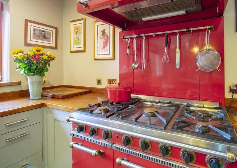 The kitchen is fitted with a range of integrated appliances, stylish units, cabinets and work surfaces. But the highlights is this Aga, which will turn you into a  masterchef!