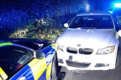 Pictured is the dangerously-driven white BMW that sparked a police pursuit in Sheffield in the early hours of October 9, 2021.