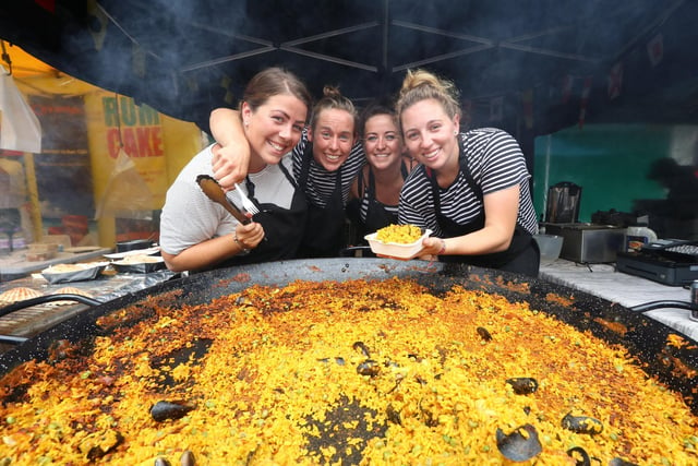 Southsea Food Festival 2017 at Palmerston Road,  Southsea. Daniella Thoms, Lizzie Thoms, Nadine Connelly and Holly Murphy of Mr G's Seafood shack serving  Seafood Paella. Picture: Habibur Rahman
